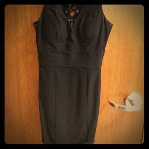Black, short, tight dress with lace up back